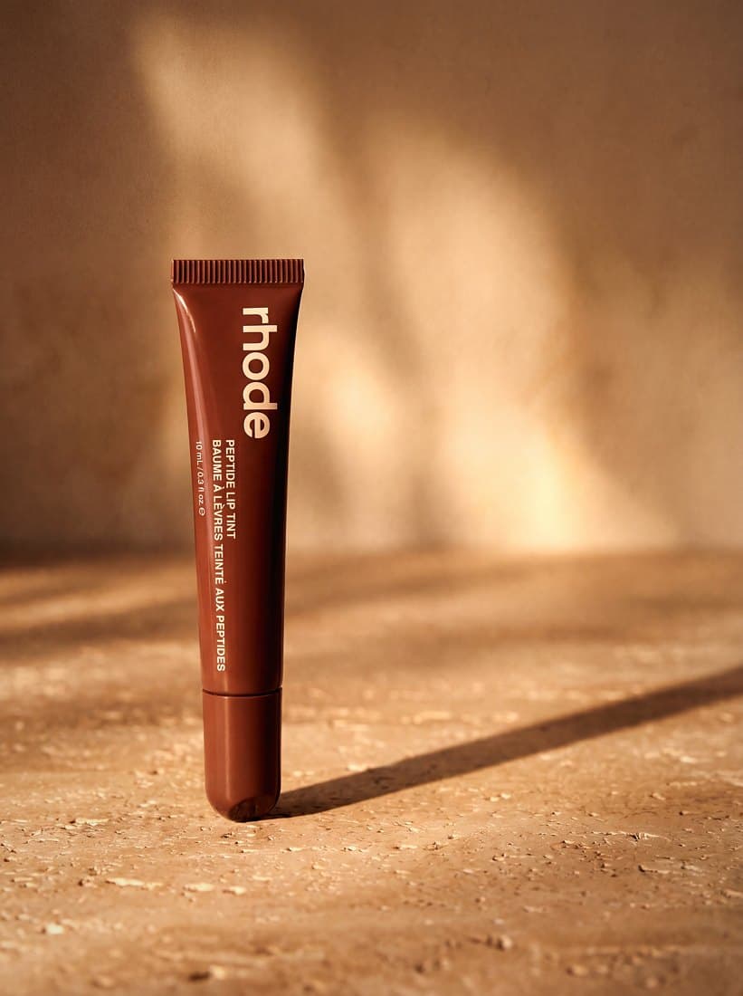 Lip tint editorial close-up, glossy swatch texture in macro